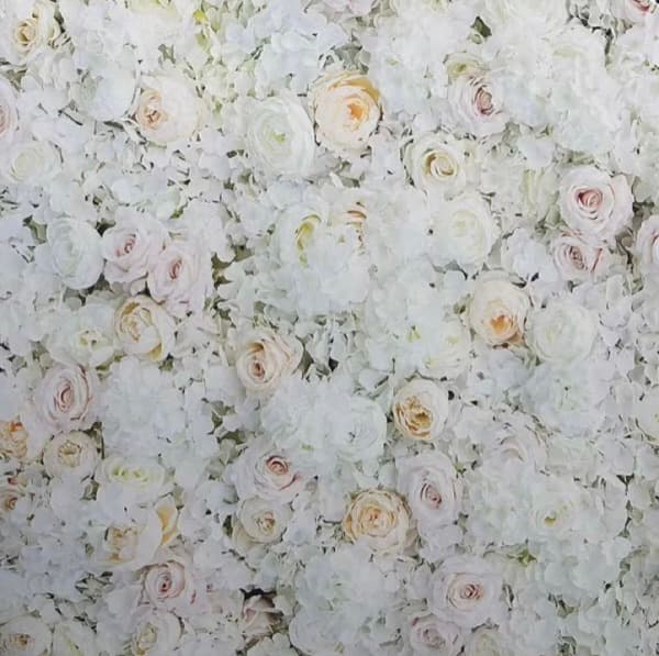 White and blush floral backdrop wall, densely packed silk roses and peonies in cream and soft pink